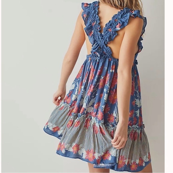 FREE PEOPLE Bali Wild Daisy Slip /
Stellar Combo size Medium - Picture 14 of 14